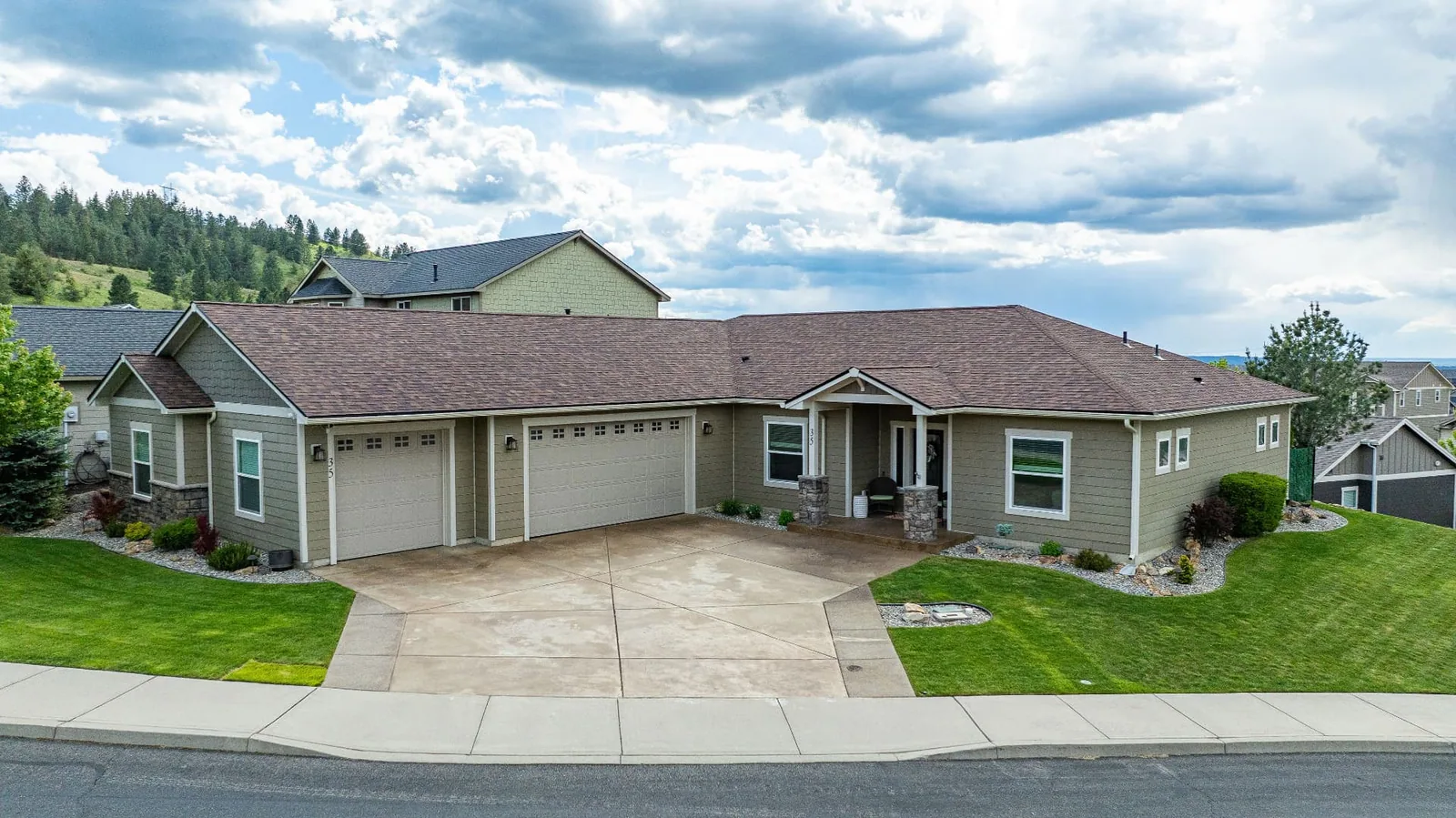 Street-level aerial of the single-level craftsman home at 35 S Parkview, Spokane